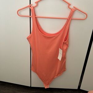 Pink, XS Abercrombie bodysuit. Tags still on. Never worn